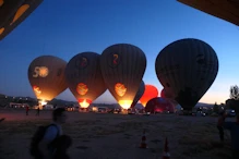 Balloons filling and rising