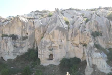 More caves across the valley