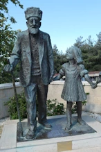 Statue of the oldest surviving defender + child