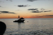 Boats with sunset backdrop