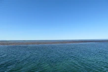 The top of the reef now almost as high as channel