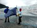 On the glacier<br />Nick + Robyn + flag